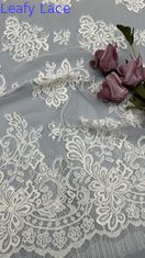 Haftowana koronka wysokiej jakości tiul z delikatnym kwiatowym wzorem do eleganckiej odzieży wieczorowej
