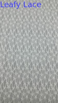 Biała koronkowa tkanina wysokiej jakości z ażurowym wzorem dla eleganckiej sukni ślubnej